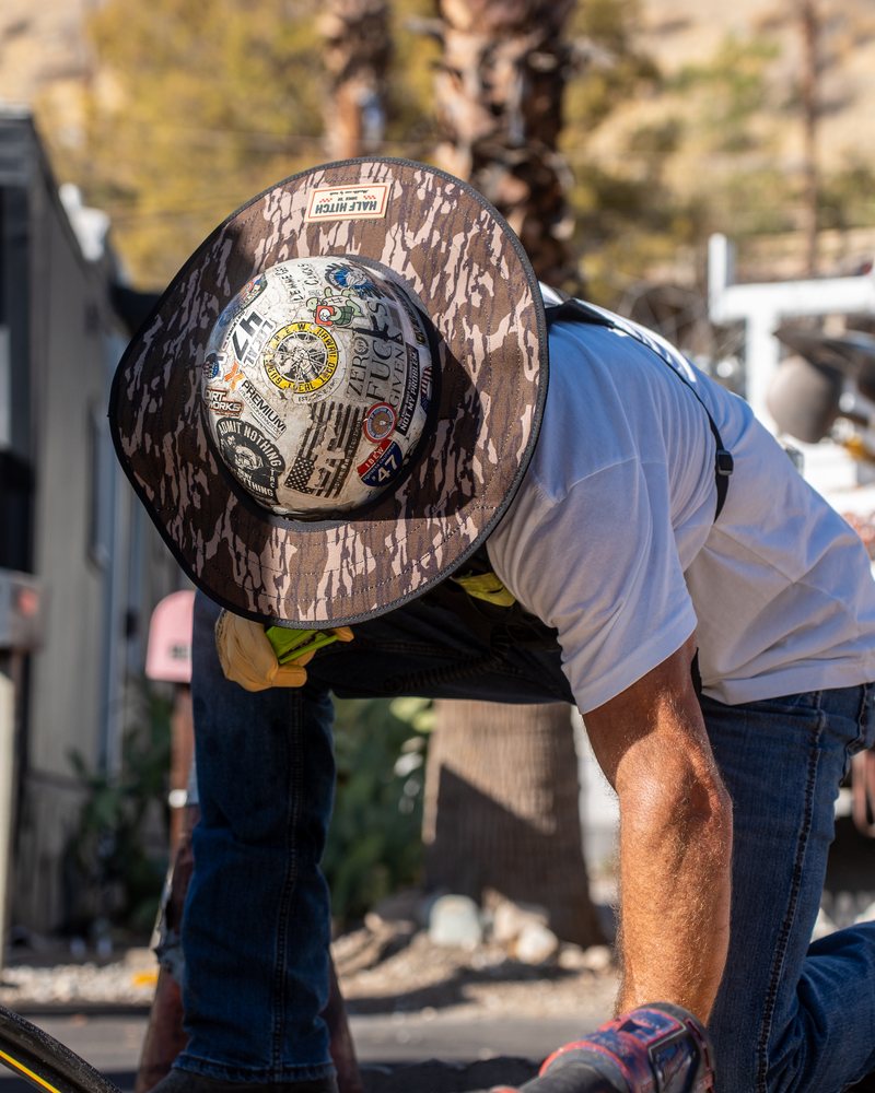 Half Hitch Woodland Camo sun shade on a stickered hard hat
